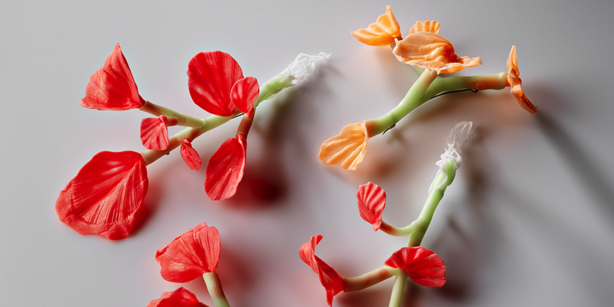 Catherine Truman's fluorescent plant-like brooches.