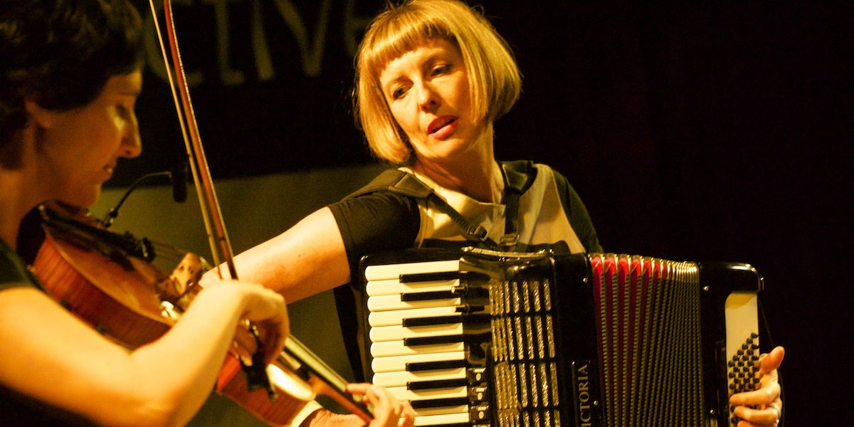 The Baker Suite's Gayle Buckby on piano accordion and vocals with Karen De Nardi on viola. Photo Peter Tee