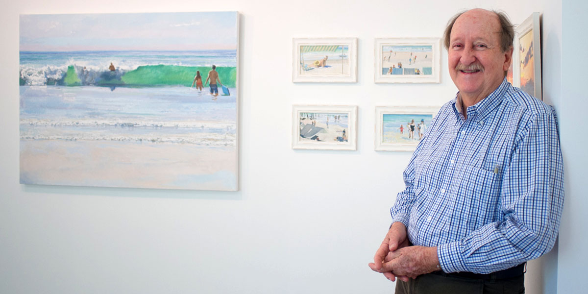 Artist Hugo Shaw with his exhibition at the Hanrahan Studio. Photo Nat Rogers/InDaily