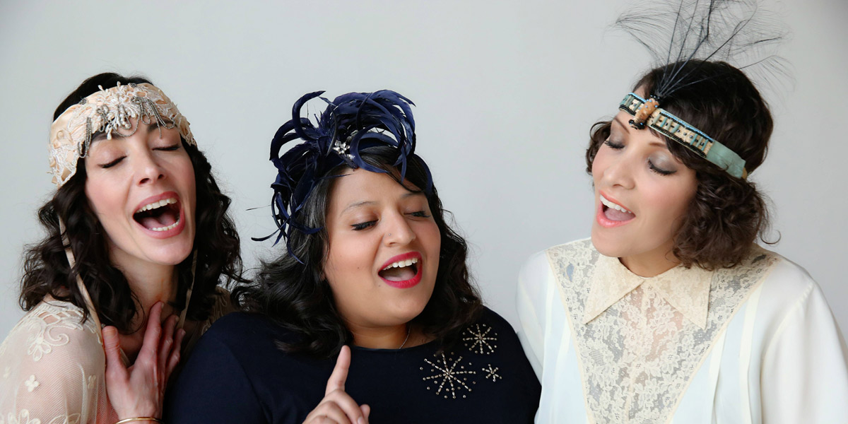 Dannielle DeAndrea (left) with fellow SongBirds Erica Canales and Gaby Moreno.