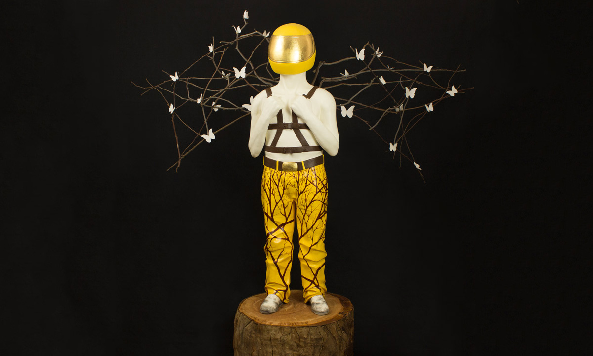 Icarus: Earthenware, synthetic polymer, gold leaf, porcelain, wooden branches and log. By Klaus Gutowski
