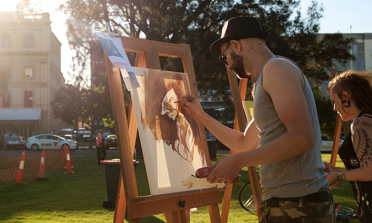 Artists James Dean and Nickas Serpantius at the previous Art Battle Spectacular.