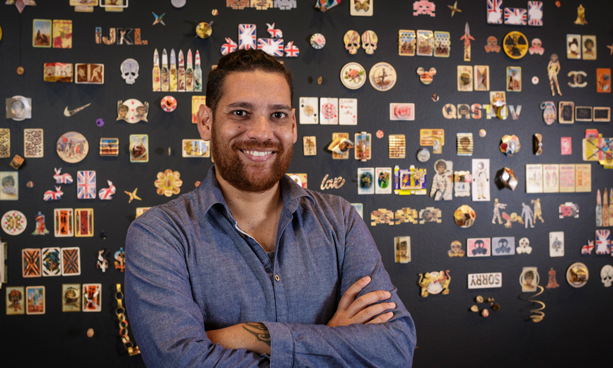 2016 Fleurieu Art Prize winner Tony Albert with his work. Photo: Sam Noonan