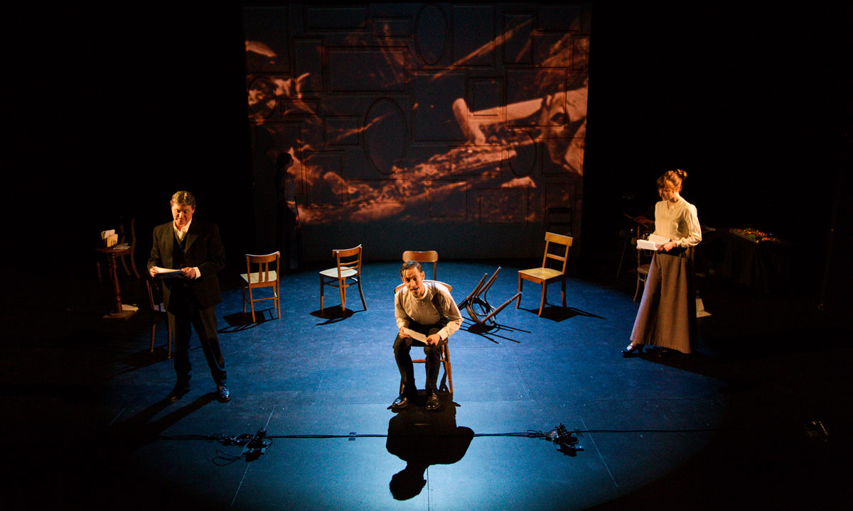 Clever set design and a backdrop of images add to the impact of The Red Cross Letters.  Photo: Shane Reid