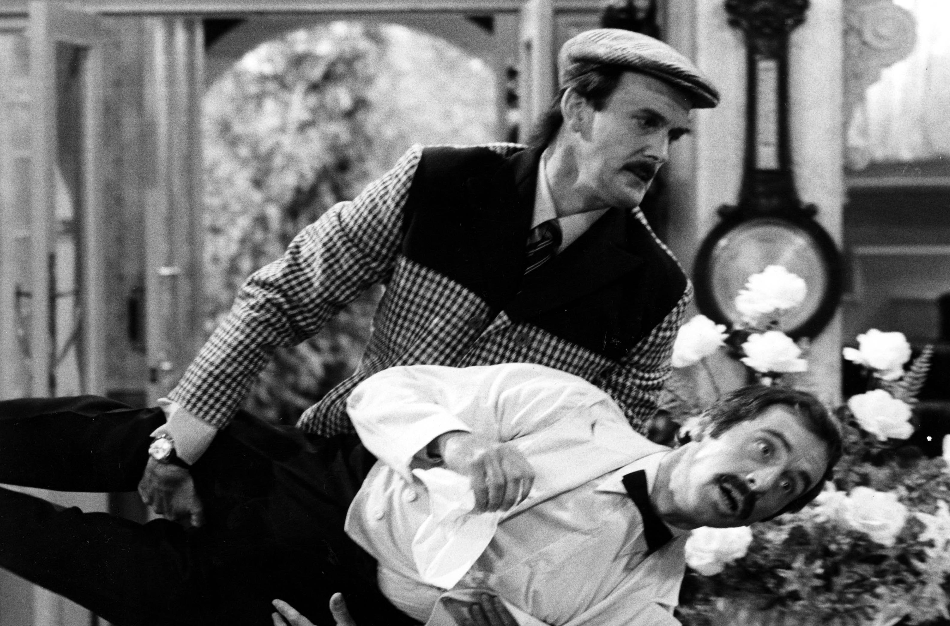 "He's from Barcelona": John Cleese as Basil Fawlty carries Manuel, played by Andrew Sachs.