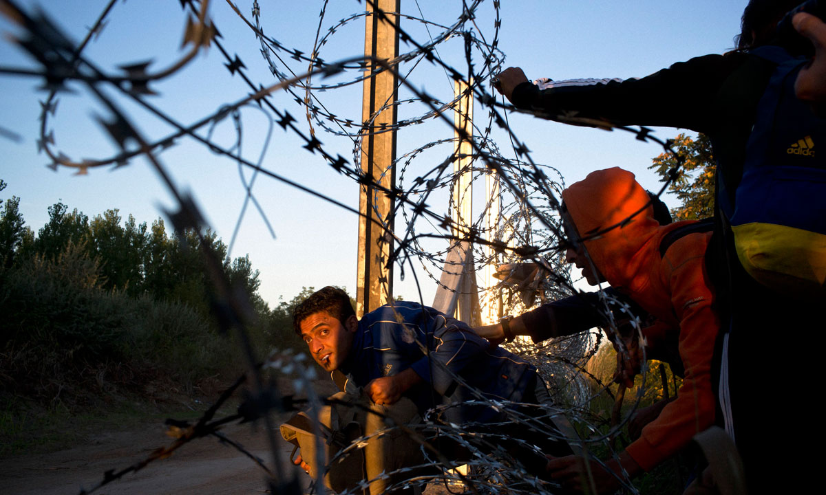 David Maurice Smith, ‘Refugee Crisis in the Balkans’, 2016  (cropped image - see full photo below). Courtesy Mother Jones Magazine and Guardian