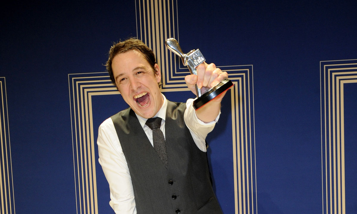 Samuel Johnson with the silver Logie he won for best actor. Photo: AAP