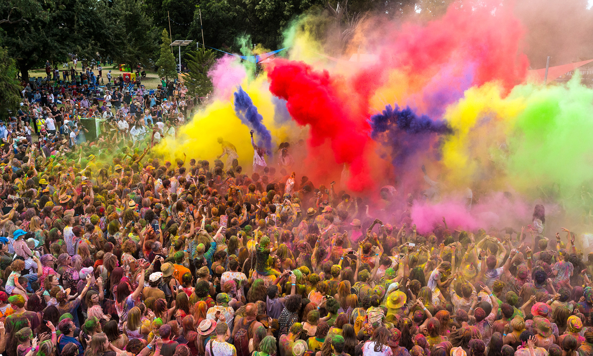 A colourful parade at WOMADelaide. Photo by Grant Hancock, from the Creative South Australia document.
