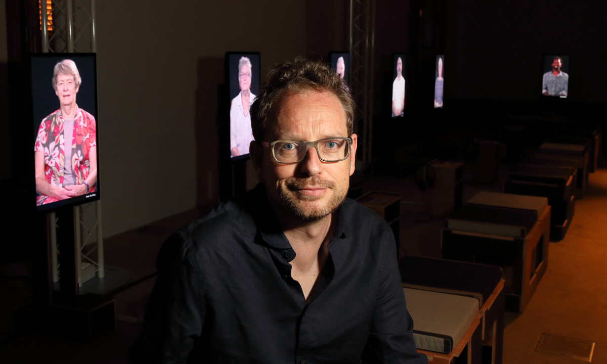 Mats Staub with his video installation at the Institute Building. Photo: Tony Lewis / Adelaide Festival 