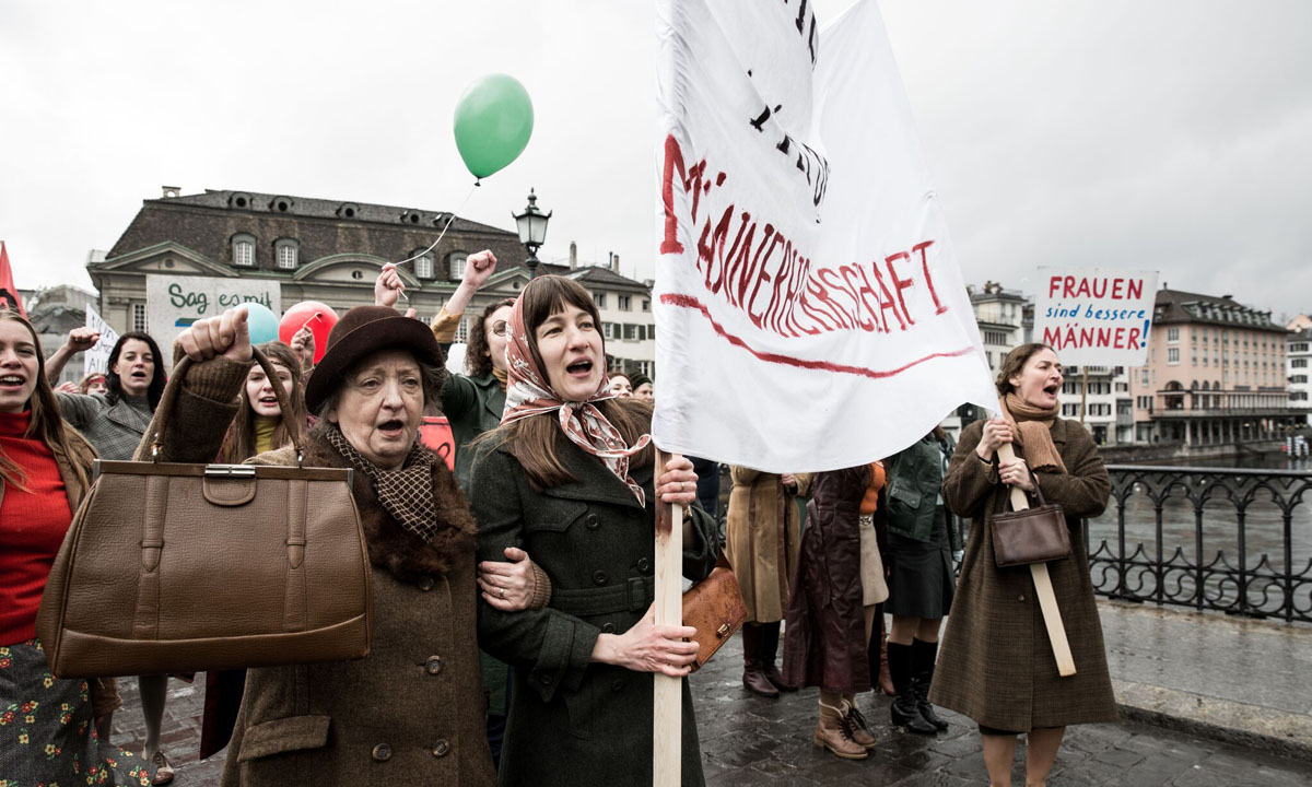 The Divine Order characters Vroni and Nora take part in a women's rights march.