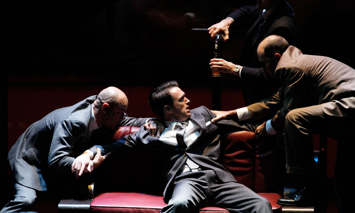 Matt Day (centre) as Roger Thornhill in North by Northwest. Photo: Jeff Busby