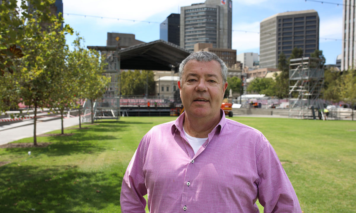 Stuart Maunder in Victoria Square, with the Carmen stage being built behind him. Photo: Tony Lewis / InDaily