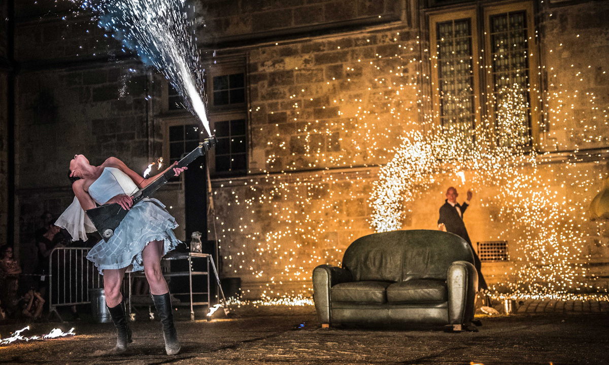 Compagnie BiLBobaSSo's site performance 'Amor' is inspired by the Tango, music and fire art.