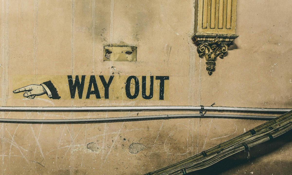An exit sign on the wall of Her Majesty's Theatre. Photo: Scott McCarten
