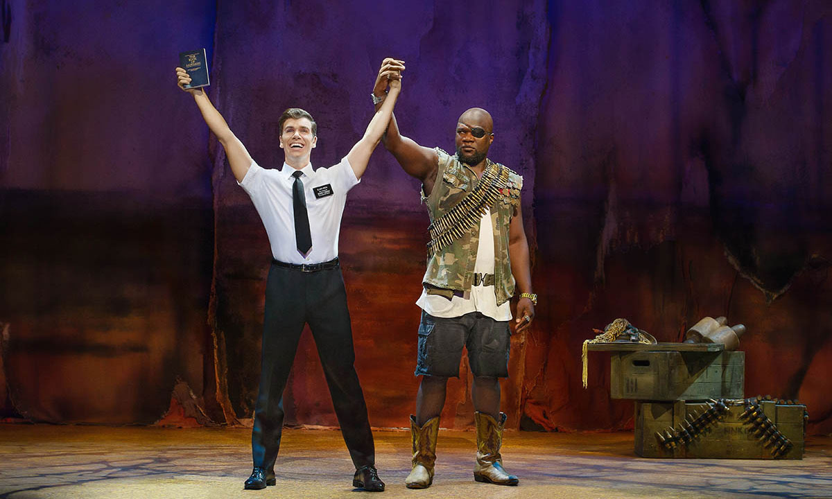 Blake Bowden and Augustin Aziz Tchantcho in The Book of Mormon. Photo: Jeff Busby