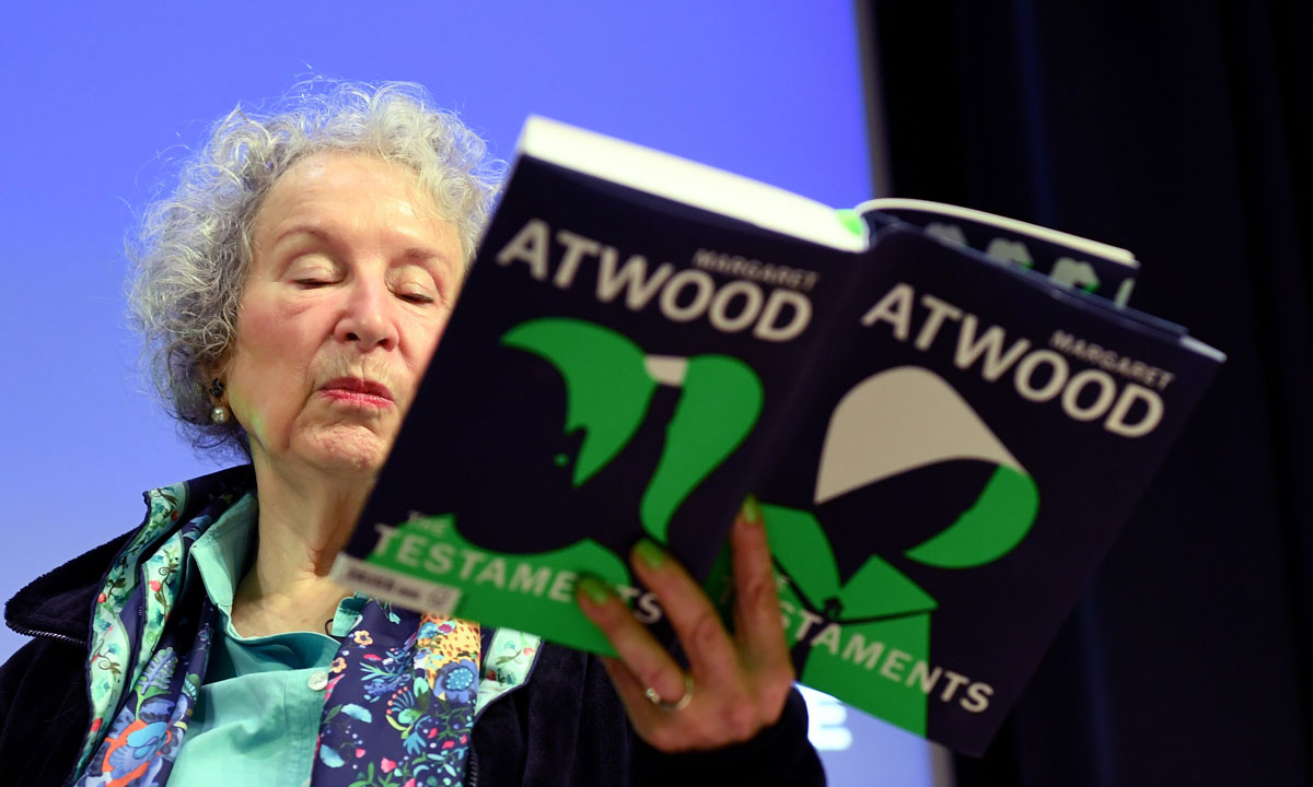 Canadian author Margaret Atwood with her new book The Testaments. Photo: EPA