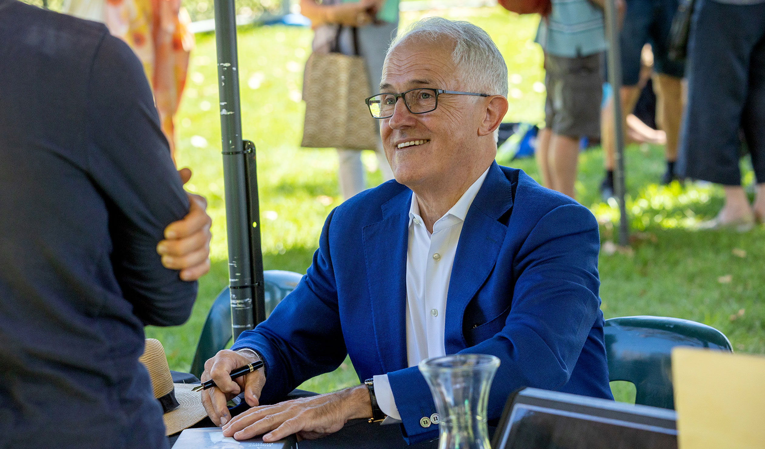 Former Prime Minister Malcolm Turnbull signing books at Writers' Week on Sunday. Photo: Tony Lewis