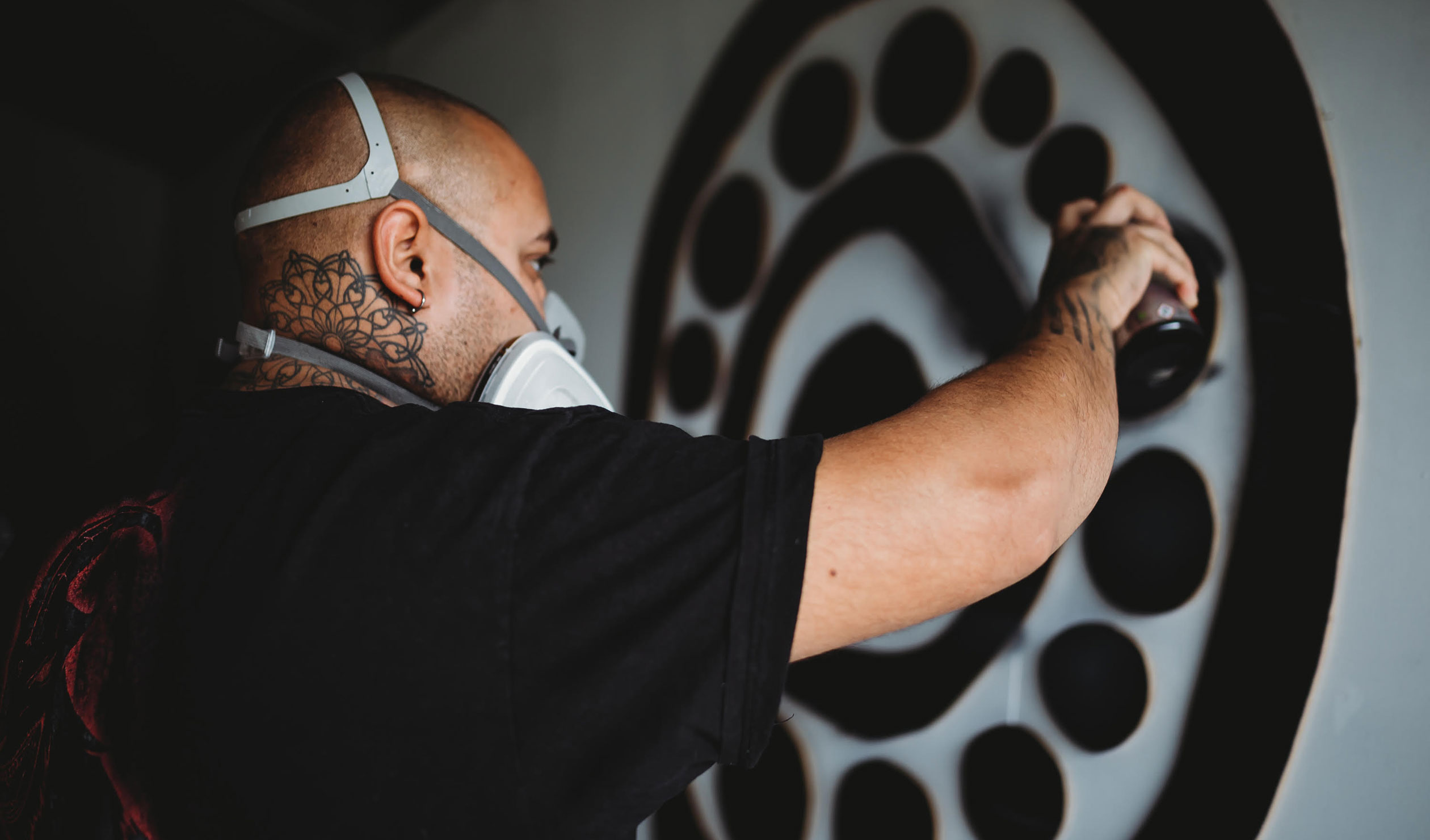 Thomas Readett works on 'Duality', a work created in collaboration with Elizabeth Yanyi Close. Photo: Renee Readett Creative