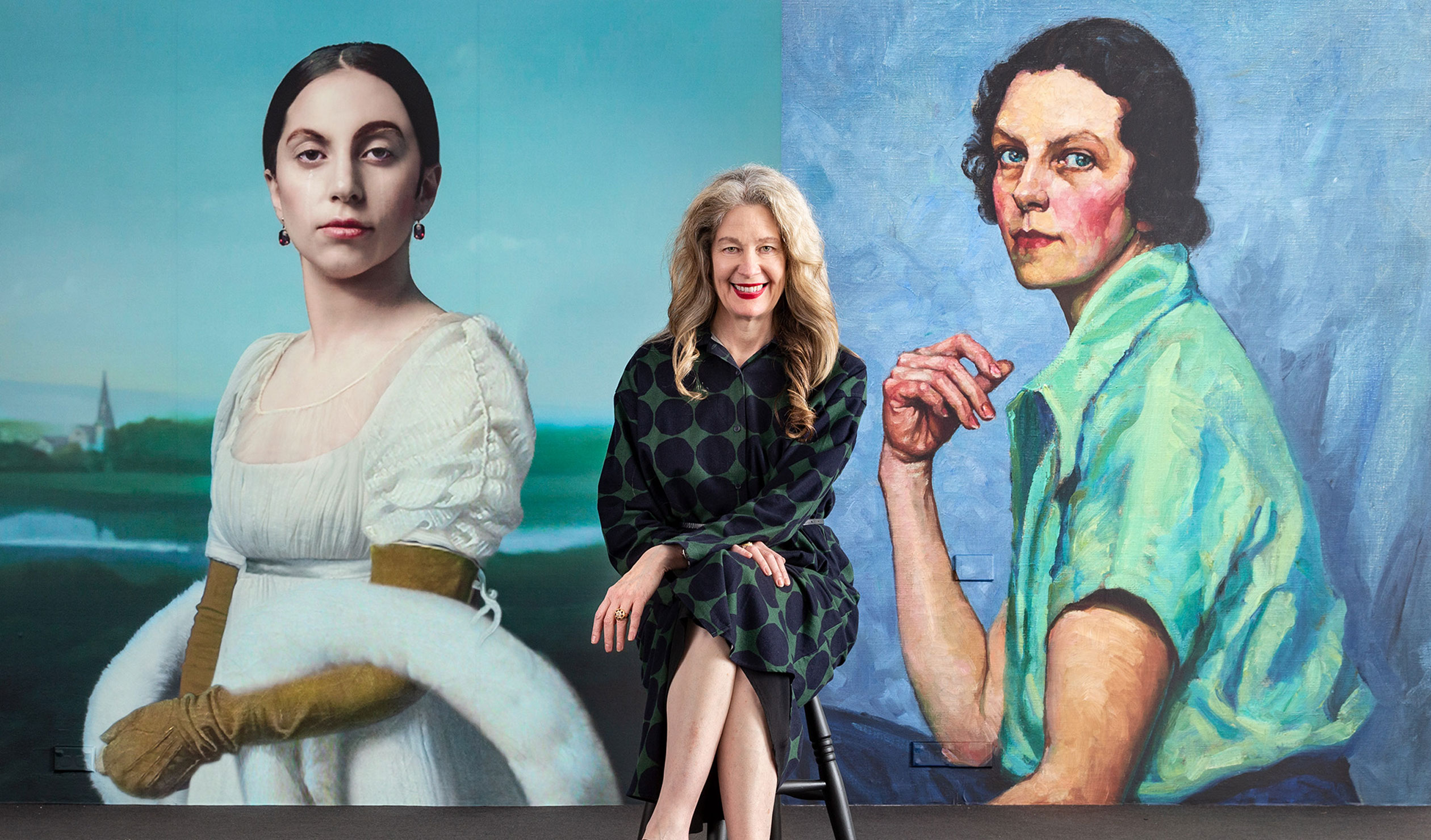 AGSA director Rhana Devenport in front of images of Robert Wilson's video portrait 'Lady Gaga: Mademoiselle Caroline Riviere', 2013, and Tempe Manning's 1939 self-portrait, which is part of the 'Archie 100' exhibition. Photo: Saul Steed