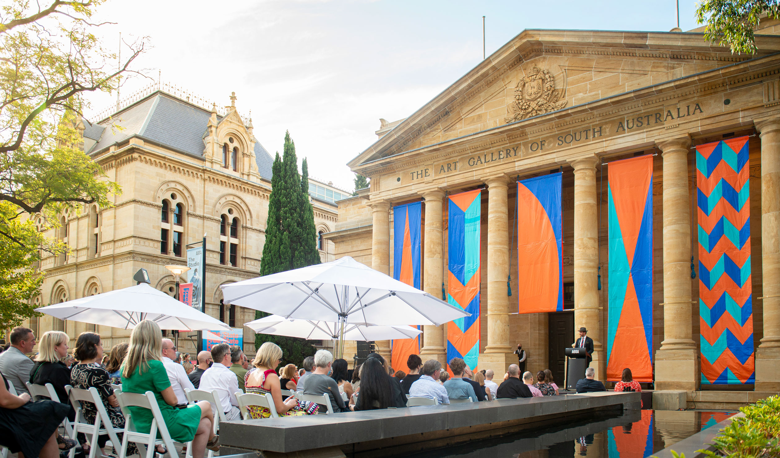 The opening of the 2022 Adelaide Biennial of Australian Art: Free/State at the Art Gallery of South Australia, with Kate Scardifield’s 'ALARUM' on the gallery facade. Photo: Nat Rogers