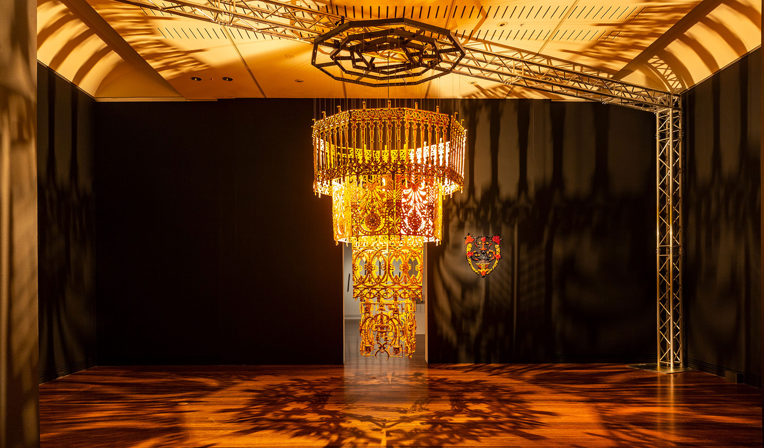 'Casting shadows [Chandelier]' and 'The Settlement [Shield]' by Dennis Golding, in the 2022 Adelaide Biennial of Australian Art: Free/State at the Art Gallery of South Australia. Photo: Saul Steed