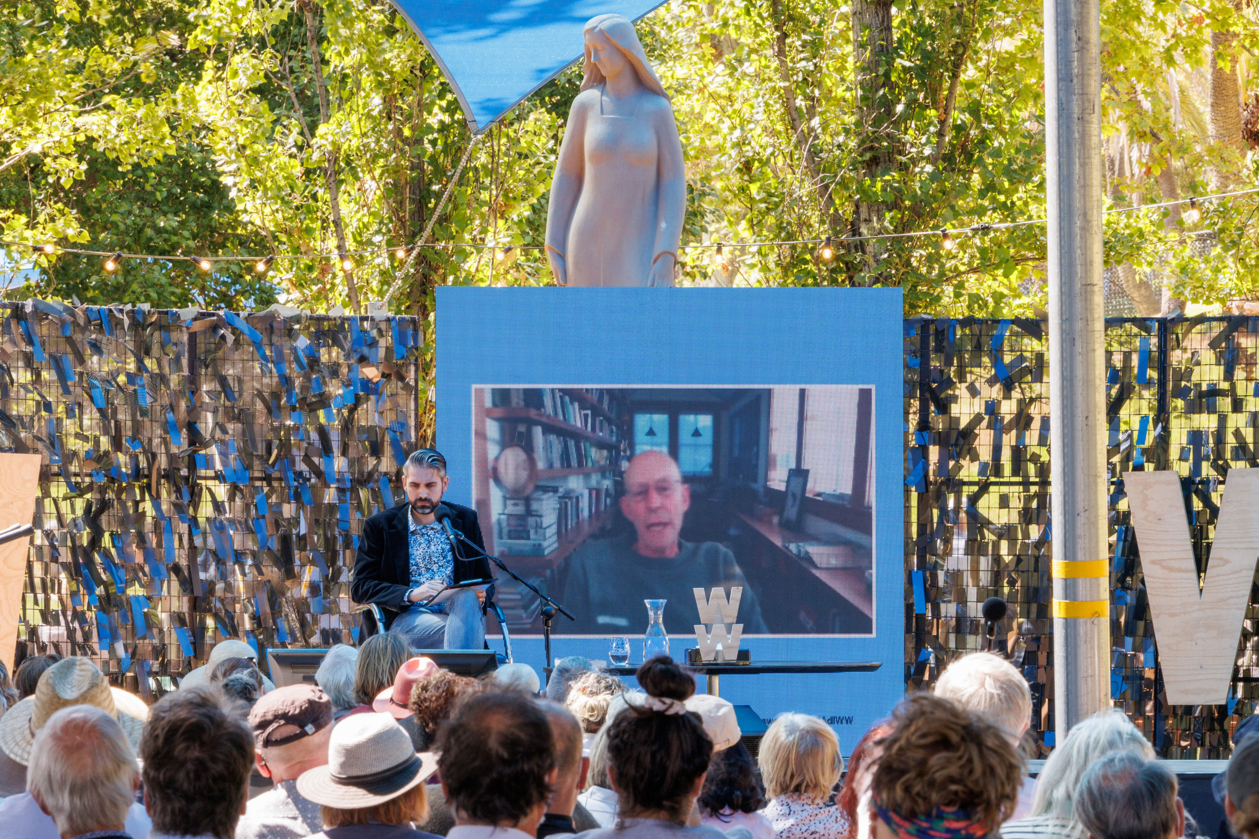 Michael Pollan, appearing at Adelaide Writers' Week via video link, with session chair Ben Brooker. Photo: Tony Lewis / InReview