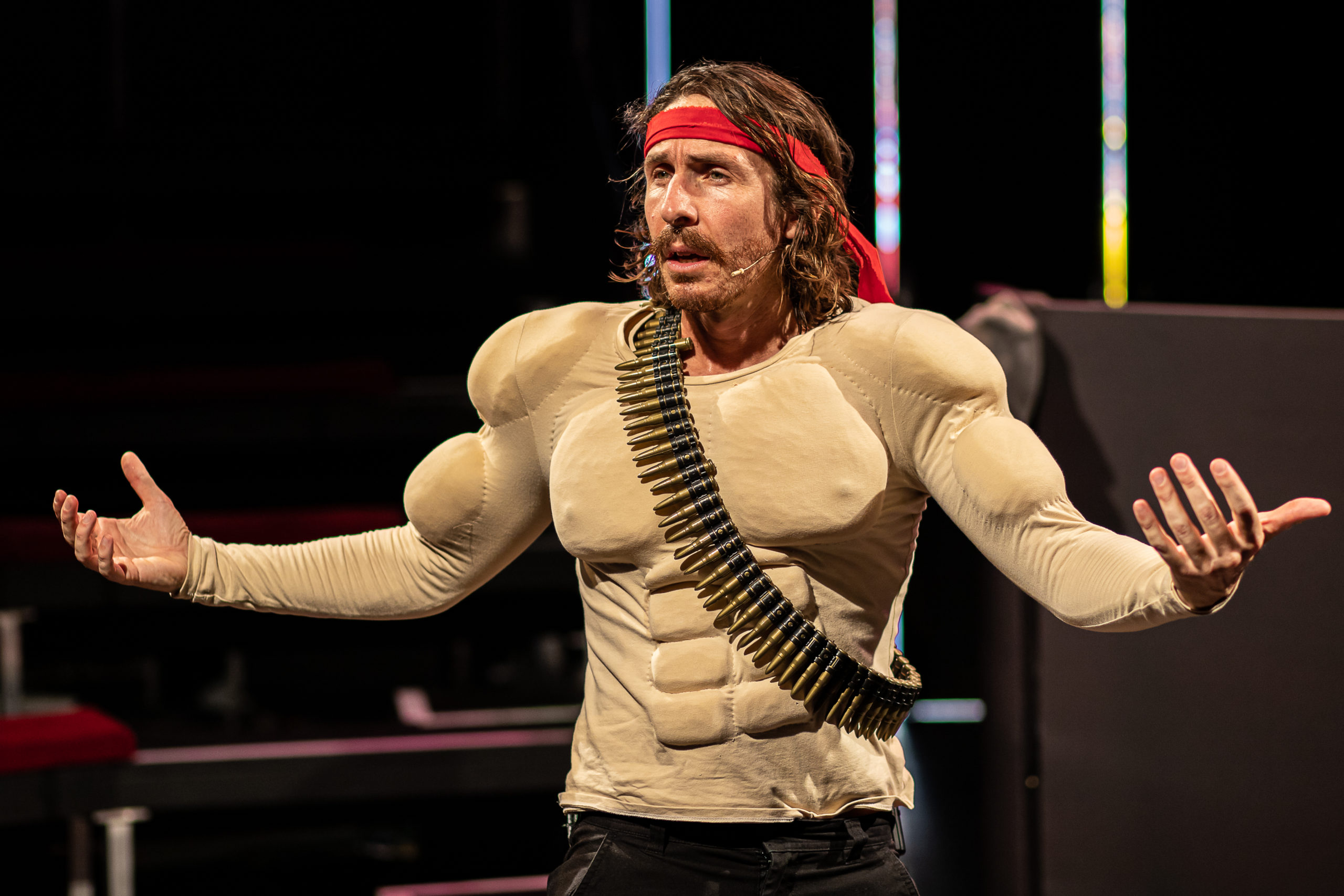 Thumbnail for MANBO brings 2022 humour to 1980s action hero tropes