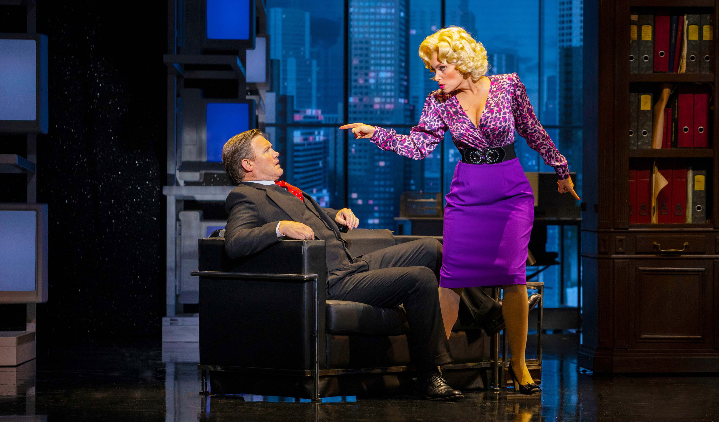 Eddie Perfect as villainous boss Franklin Hart Jnr gets a lecture from Erin Clare's Doralee Rhodes in '9 to 5 The Musical'. Photo: David Hooley