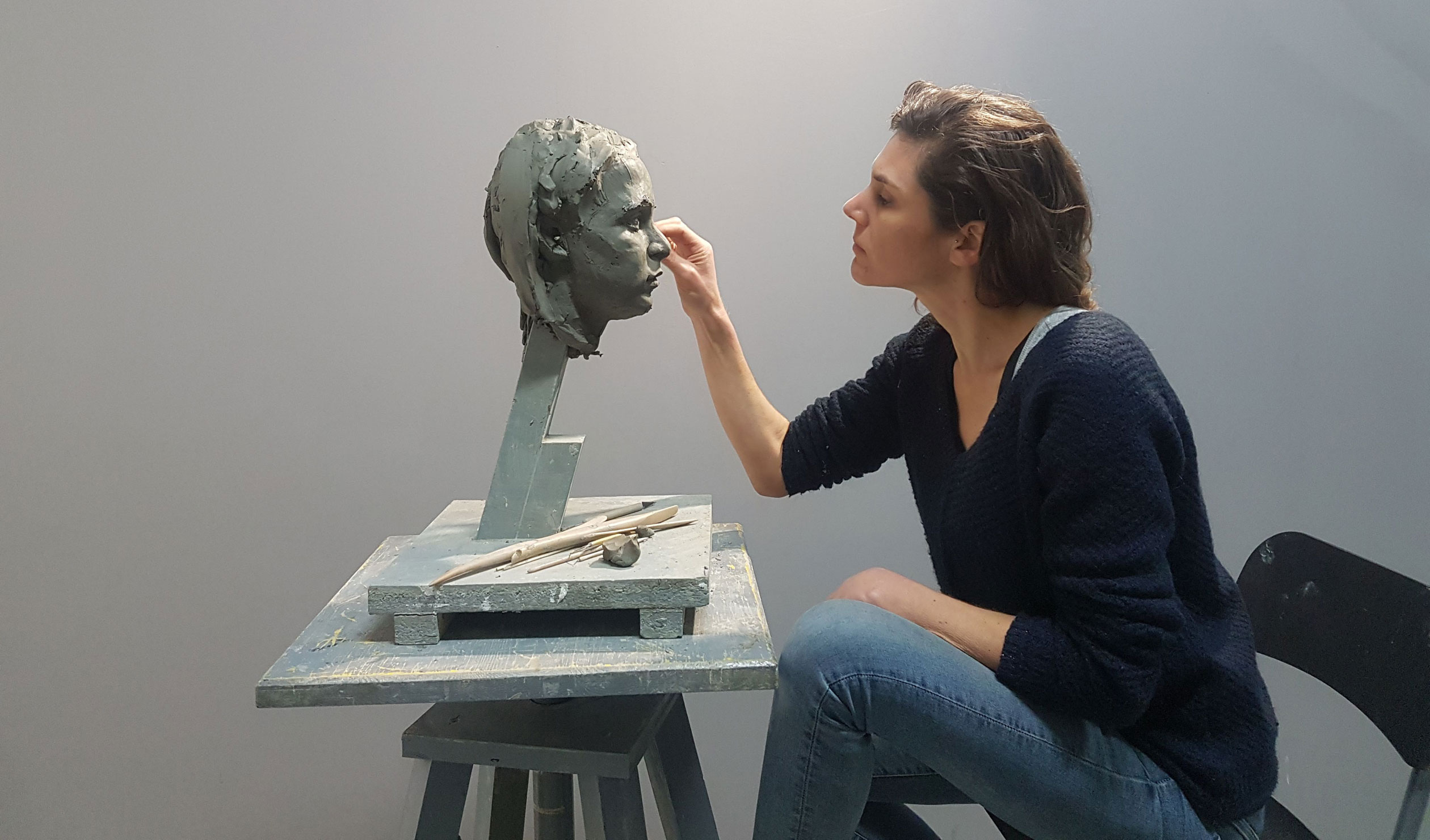 Giorgina Mills sculpting 'Dasha' in 2019, during her fourth year of a residency at the Florence Academy of Art in Italy. Photo: Supplied 