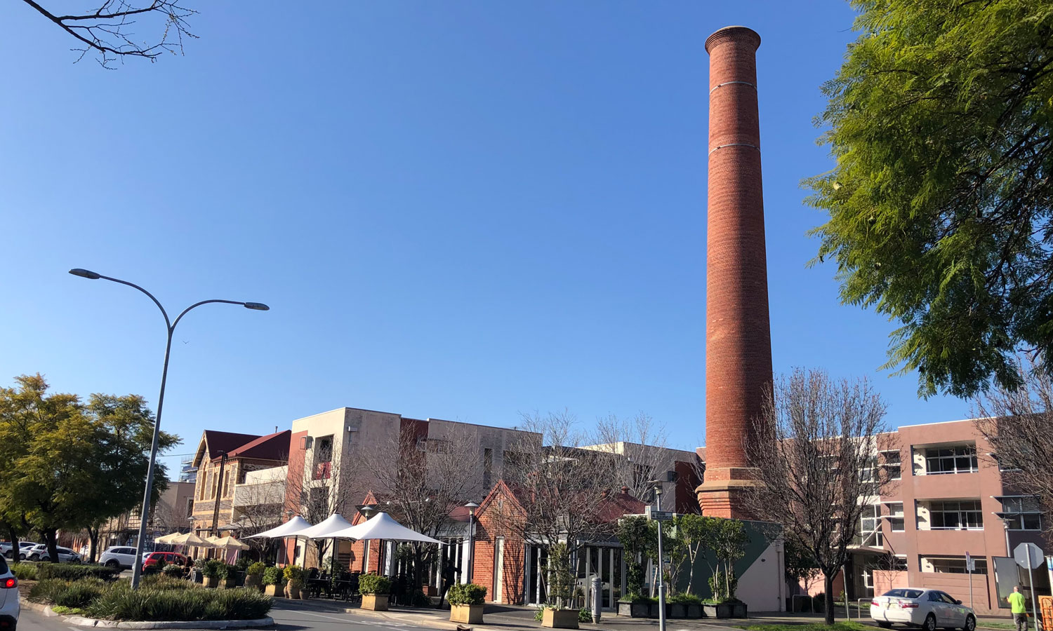 The turn-of-the-21st-century conversion of the city’s waste incinerator into the landmark The Greek on Halifax led the way for ongoing architectural adaptions in this now booming precinct.