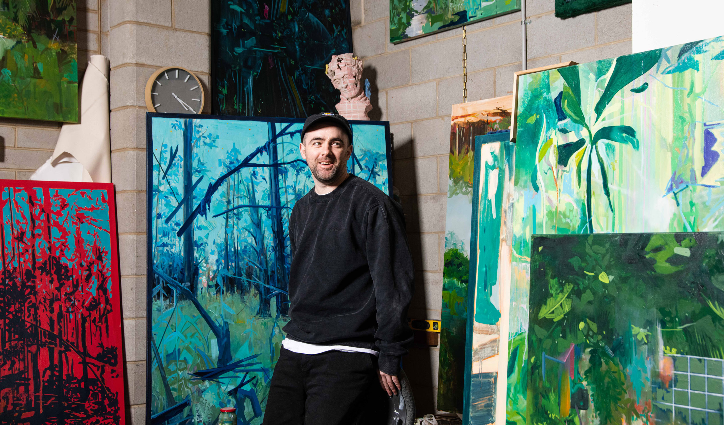 Michael Carney in his warehouse studio space in Kent Town. Photo: Jack Fenby / InReview
