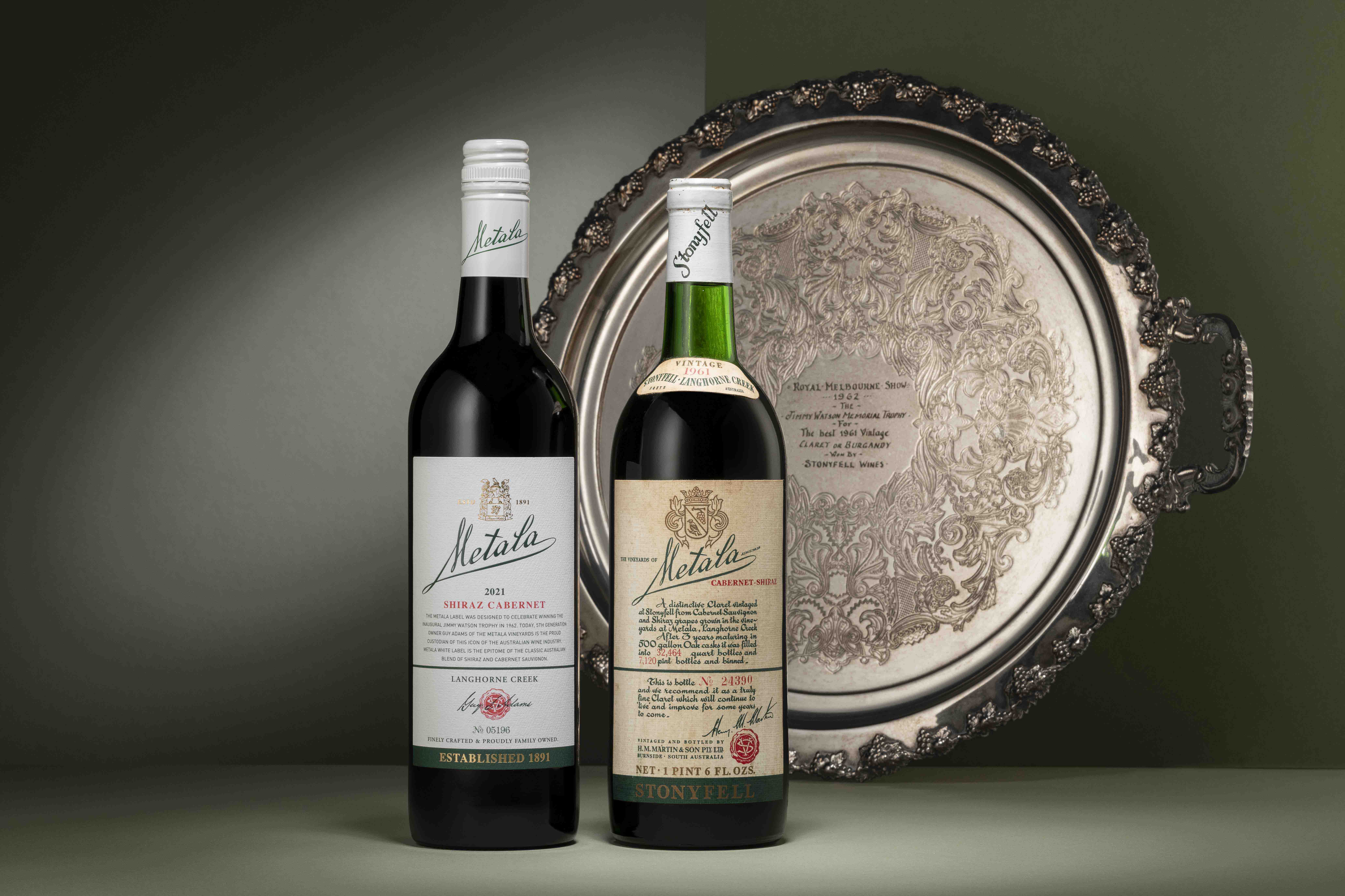 The 2021 Metala Shiraz Cabernet, back in family hands, next to the 1961 Jimmy Watson winning version of the same blend. Supplied image