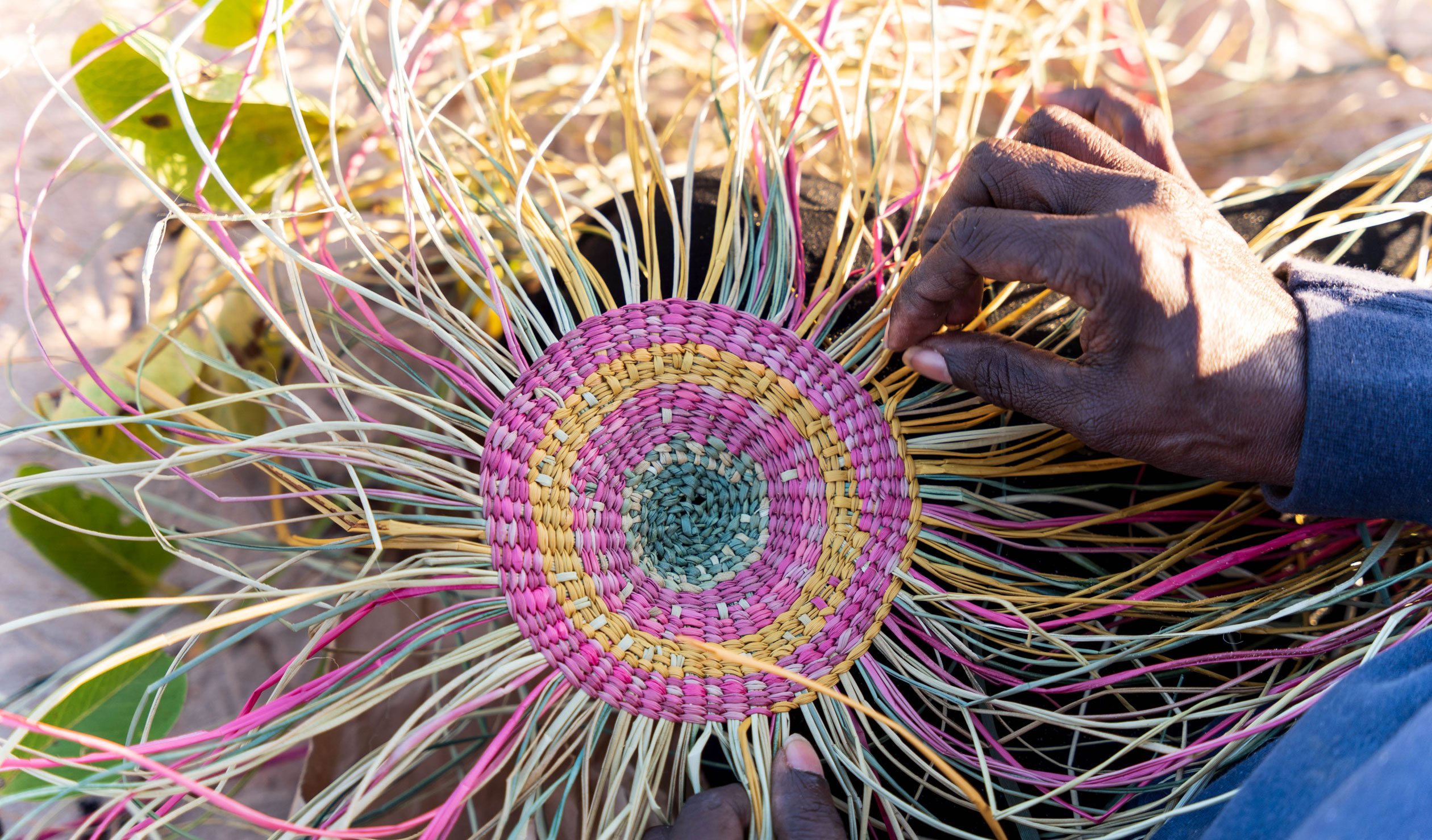 Expert weaver Rose Wilfred, from Arnhem Land, presented a sold-out weaving workshop this week in the lead-up to the Tarnanthi Art Fair.   Photo: Pouria Zoughi, courtesy Numbulwar Numburindi Arts