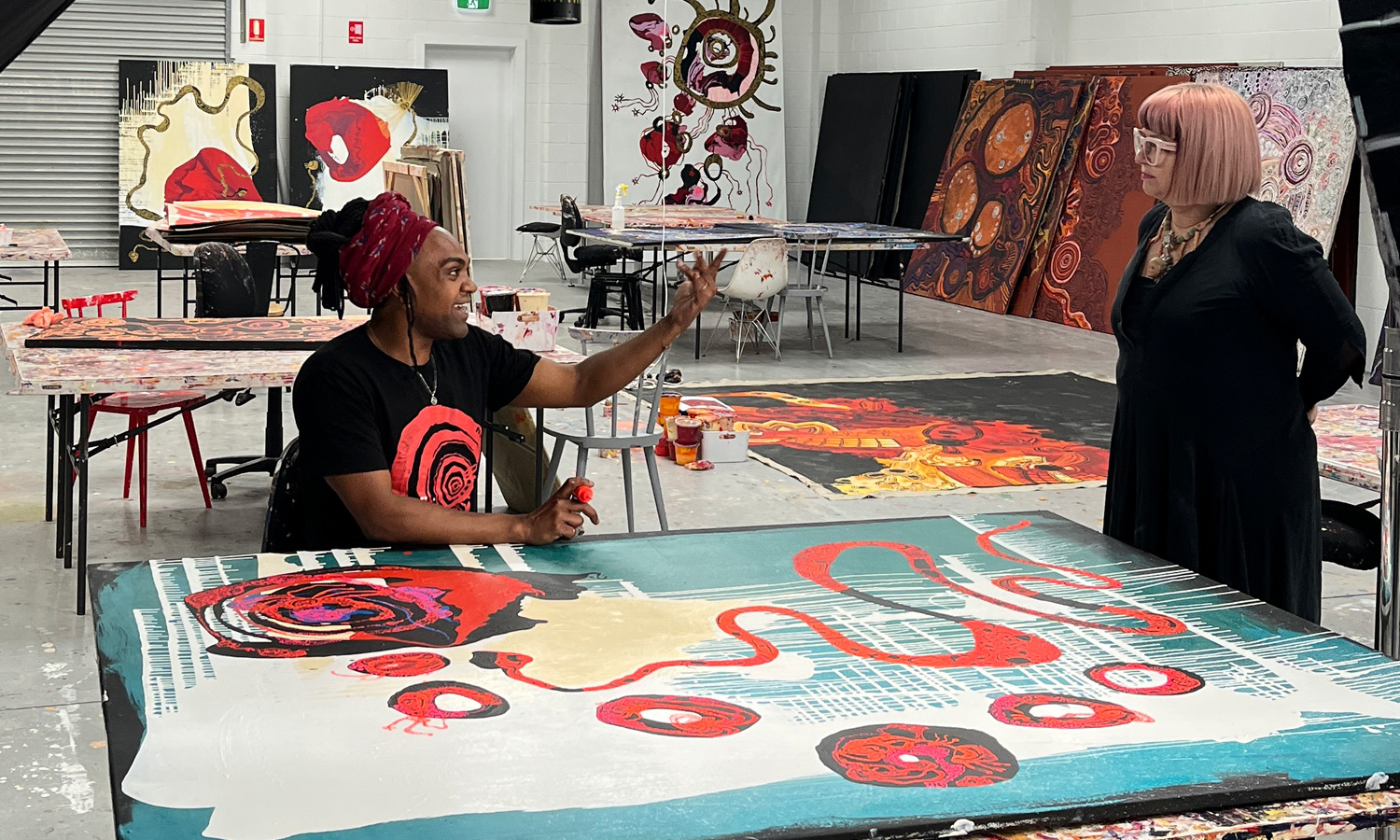 Creative collaborators Zaachariaha Fielding and Heather Croall – Fielding's paintings have inspired many of the drone animations in 'Electric Skies'. Photo: Adelaide Fringe 