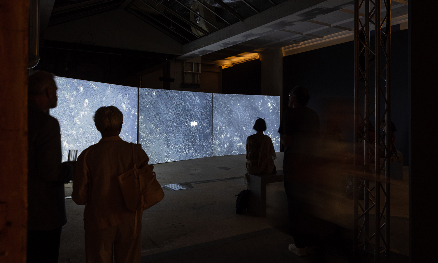 Visitors are absorbed by James Newitt's 'Haven', showing in the north-eastern concourse at Adelaide Railway Station. Photo: Sia Duff / Supplied