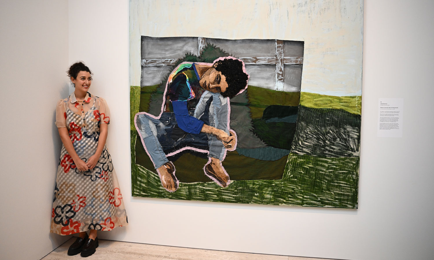 2023 Archibald Prize winner Julia Gutman with her portrait of Montaigne titled 'Head in the sky, feet on the ground' at the Art Gallery of New South Wales in Sydney. Photo: Dan Himbrechts / AAP