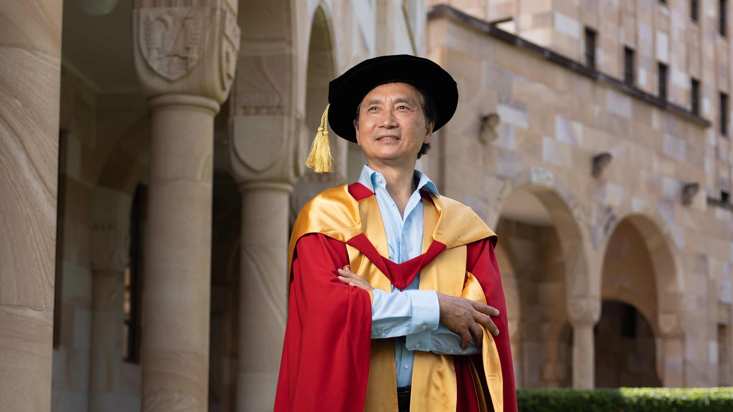 Retiring Queensland Ballet artistic director Li Cunxin after receiving an honorary doctorate from The University of Queensland. Photo: David Kelly 