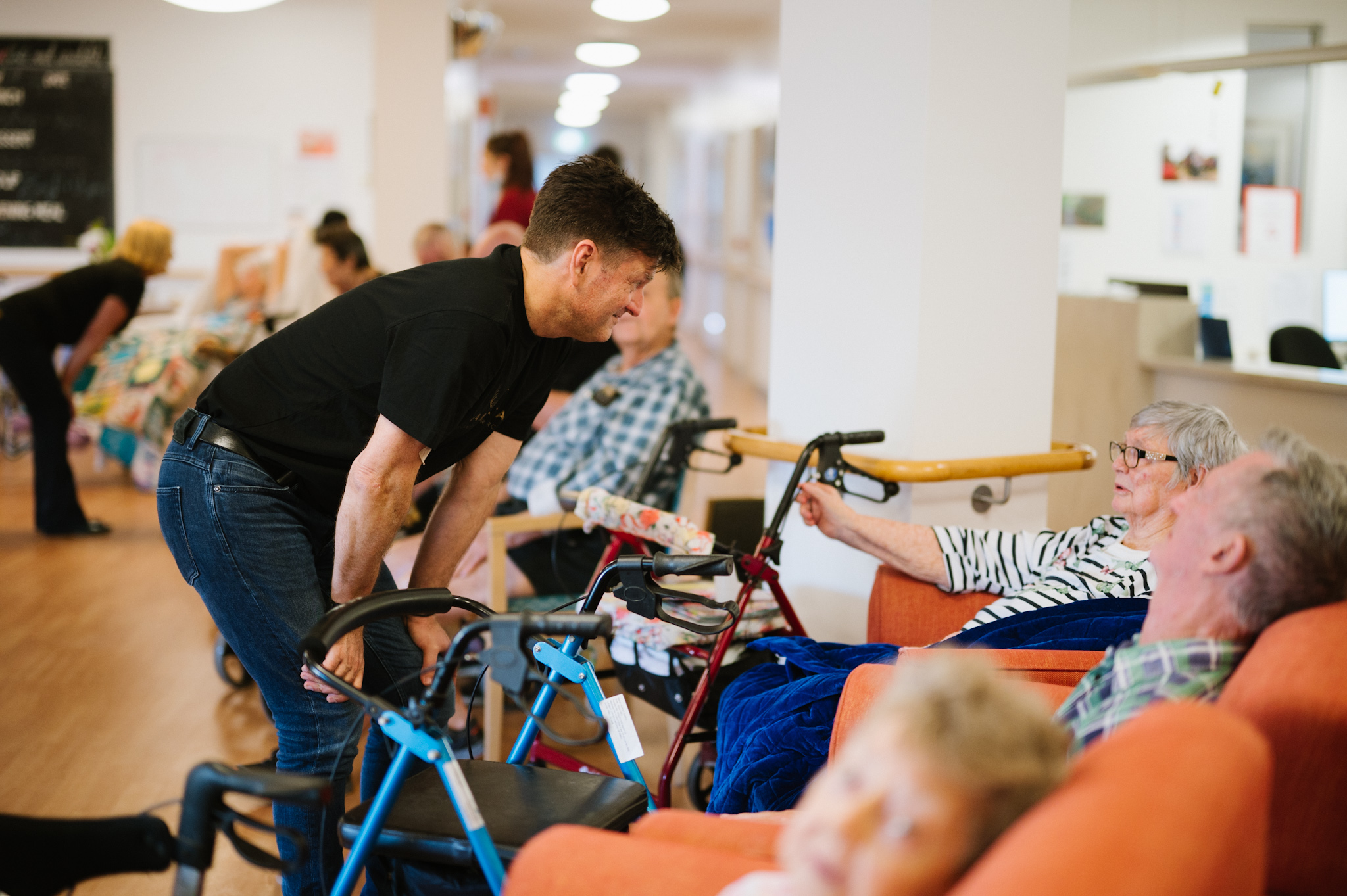 Camerata's leader and artistic director Brendan Joyce chats to residents in a nursing home in Proserpine on a regional tour. Photo: Morgan Roberts