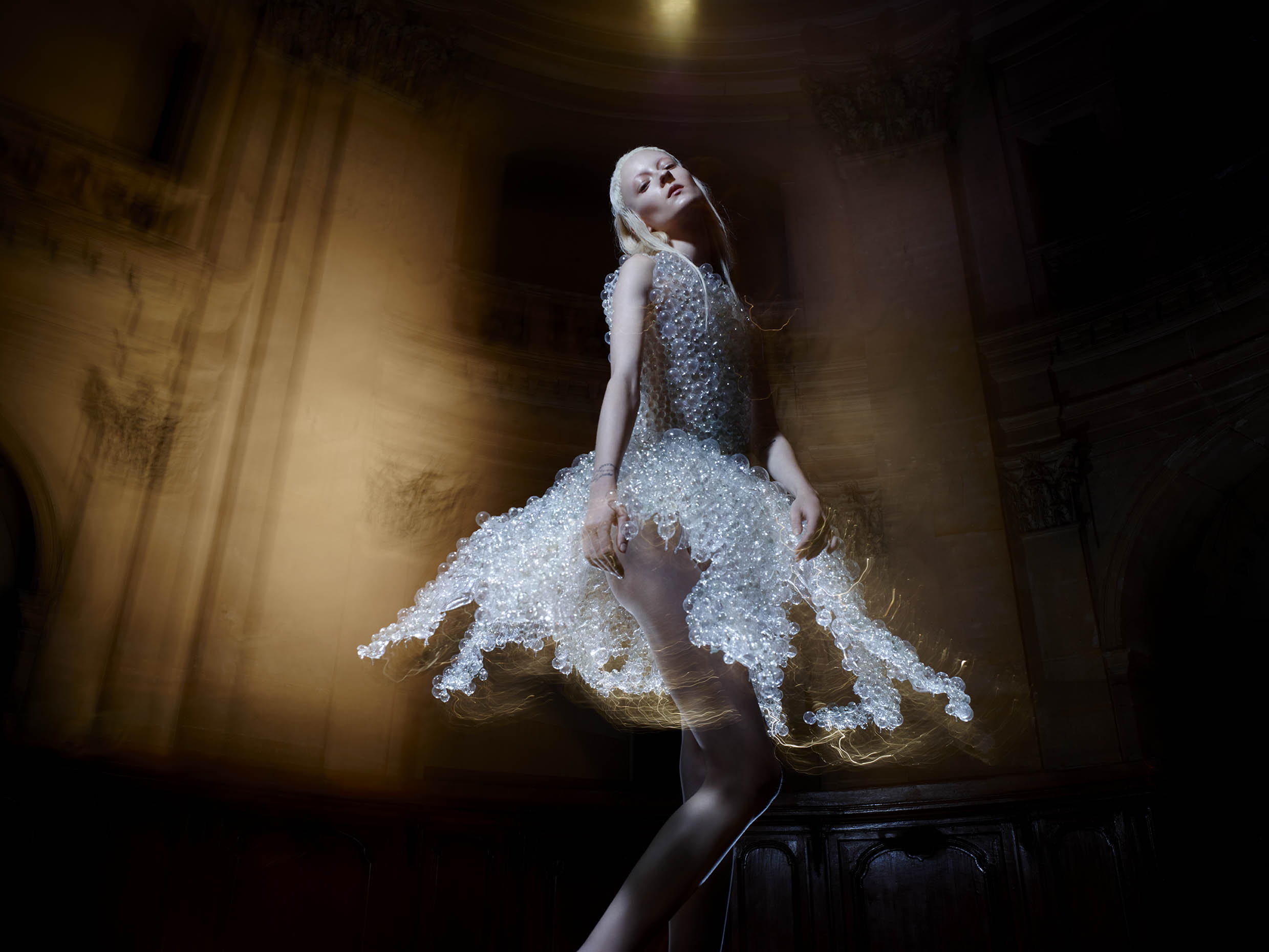 Iris van Herpen's Seijaku dress, made with glass spheres, silicone, Pet G (thermoplastic polyester), from the Seijaku collection 2016. Collection: Iris van Herpen. Photo: © Warren du Preez and Nick Thornton Jones
