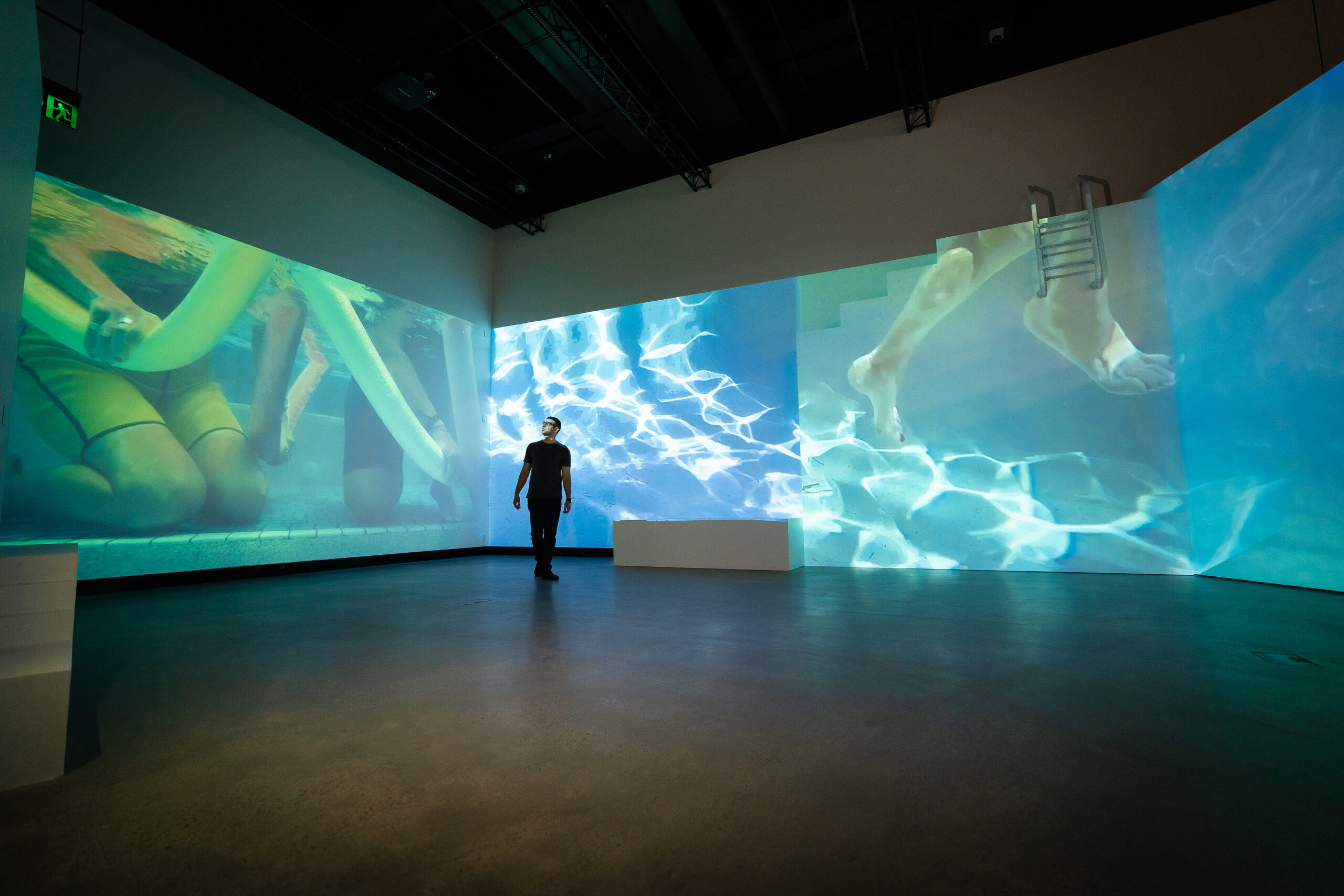 Artefacts of Leisure is a three-channel digital video installation by Kathy Mackey featuring videography by Steve Mackey and Claudio Kirac in the exhibition Here and Now: Gold Coast Triennial at  HOTA Gallery.